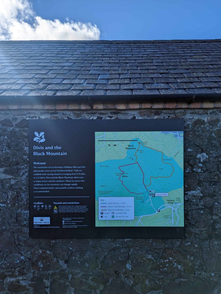 Divis and The Black Mountain trail map on the side of the Divis Coffee Barn. Shows all the walks you can to on Divis Mountain and Black Mountain.