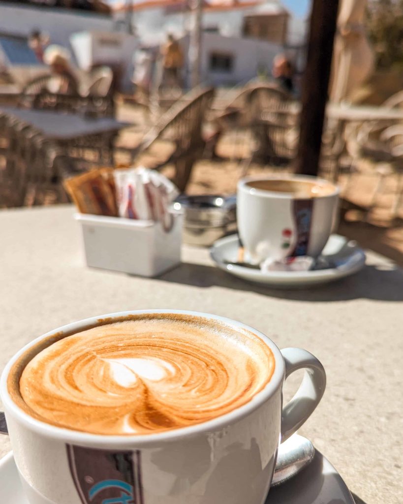 A milky coffee on the table at Waikiki Beach Bar.