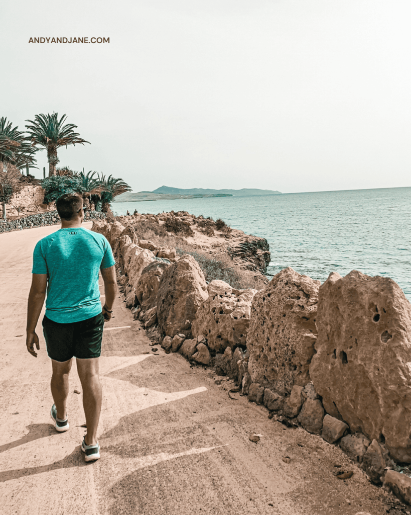 andrew walking on the promenade into Costa Calma