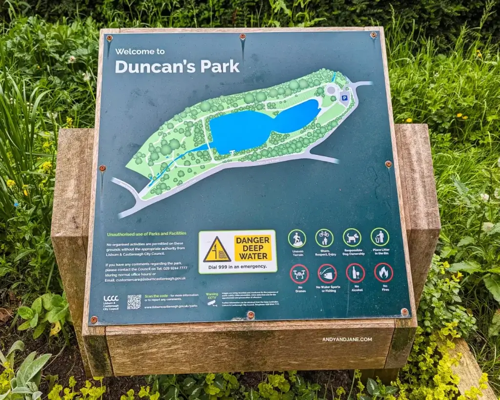 A sign in Duncan's Park displaying a map of the park & some important information.