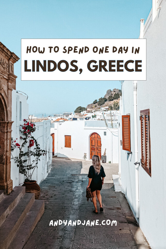 Pinterest graphic with the title 'How To Spend One Day In Lindos, Greece' with a picture of Jane in the background walking through Lindos.