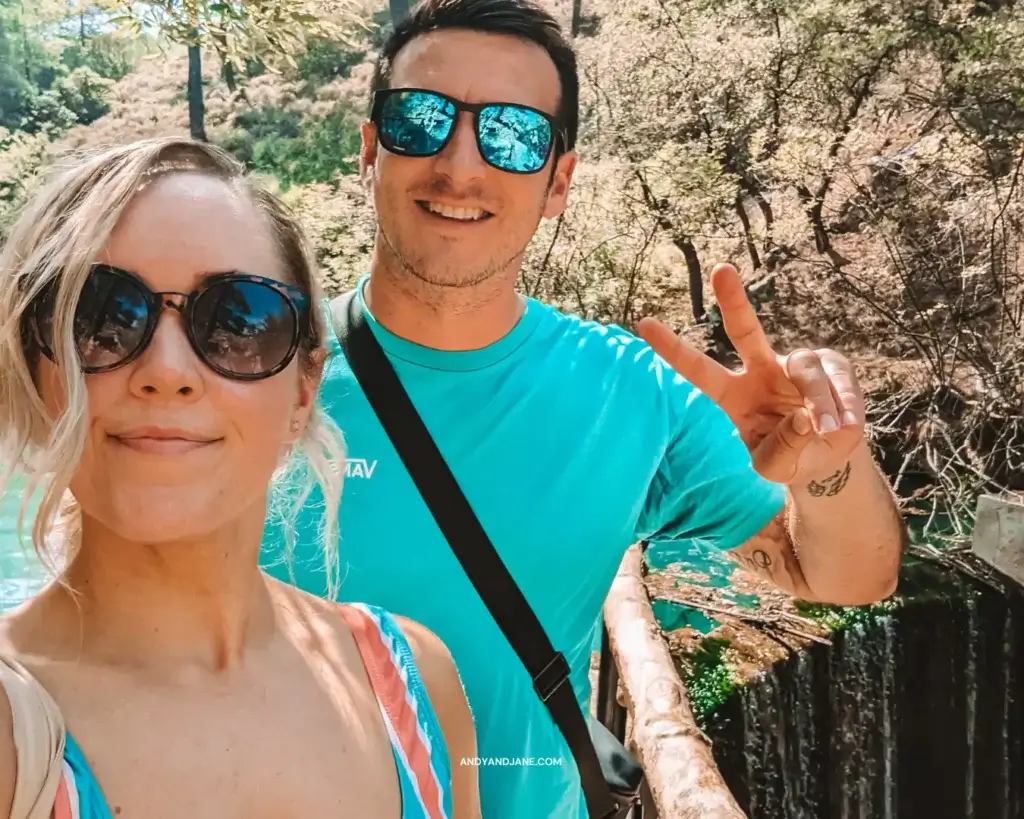 Andrew & Jane at Seven Springs in Rhodes - both wearing sunglasses and looking at the camera taking a selfie.